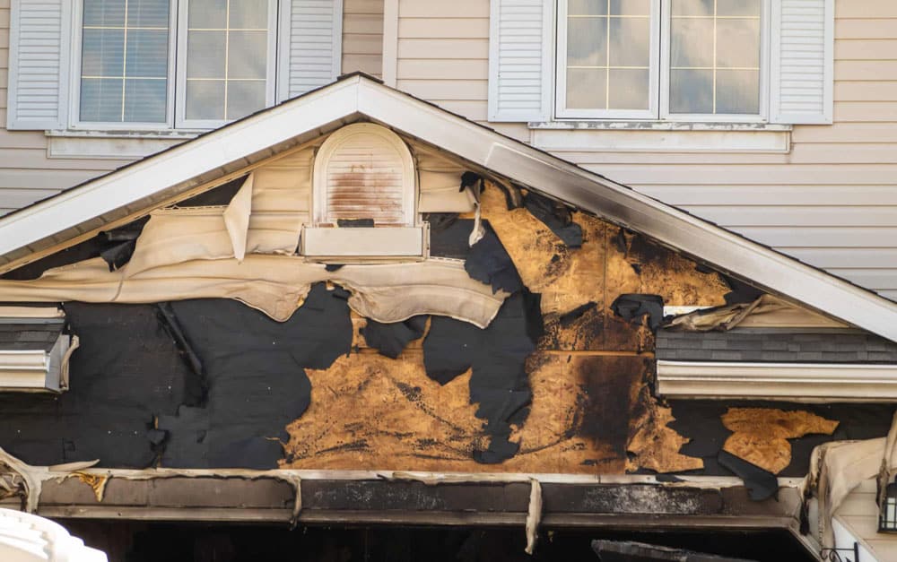 Front of roofing peeling and burnt